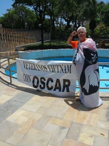 VFP Member, Margarita Lopez, holding VFP Flag